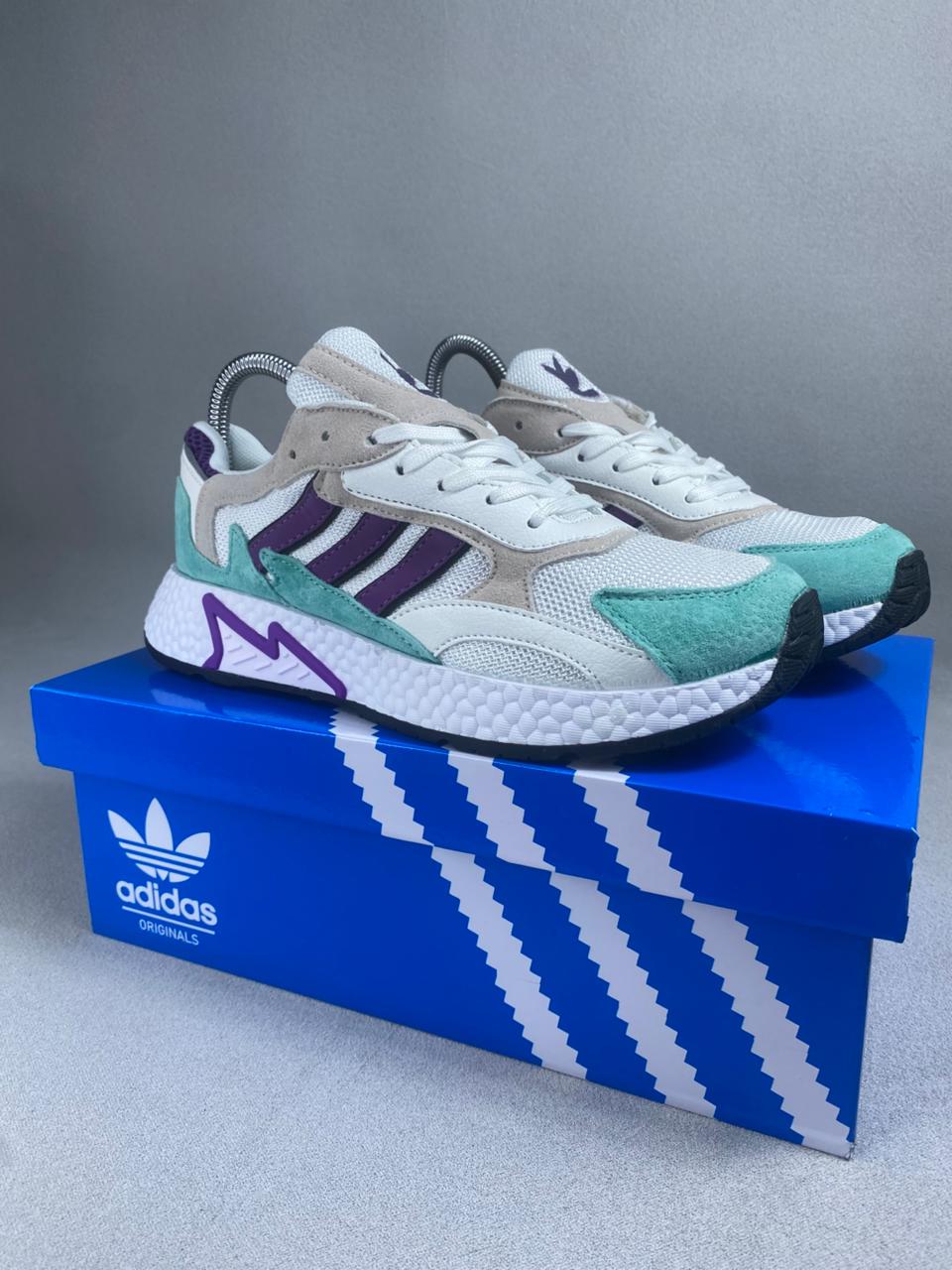 AD TRESC BLANCO MORADO H&M