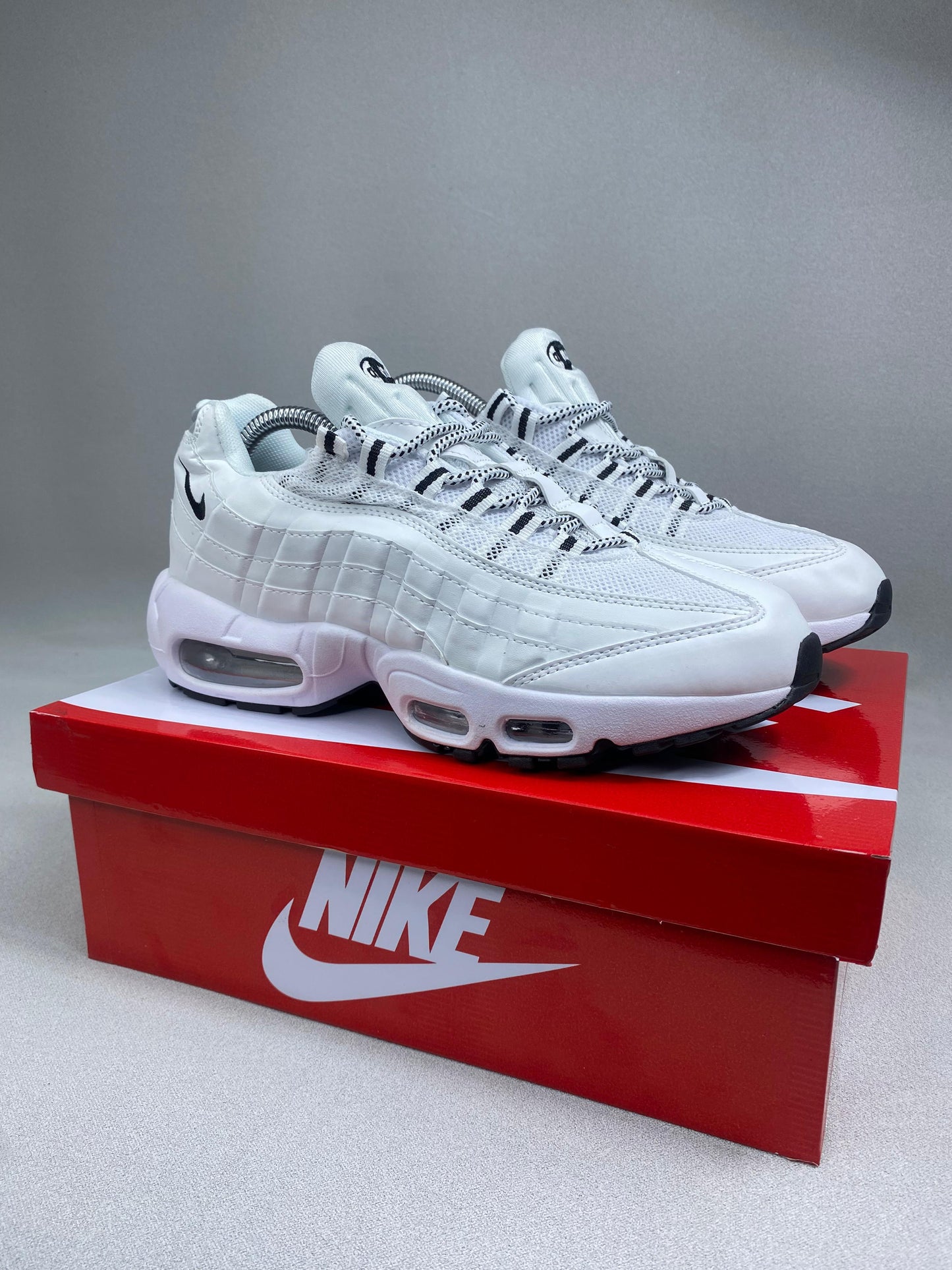 NK 7 CAMARAS HOM BLANCO