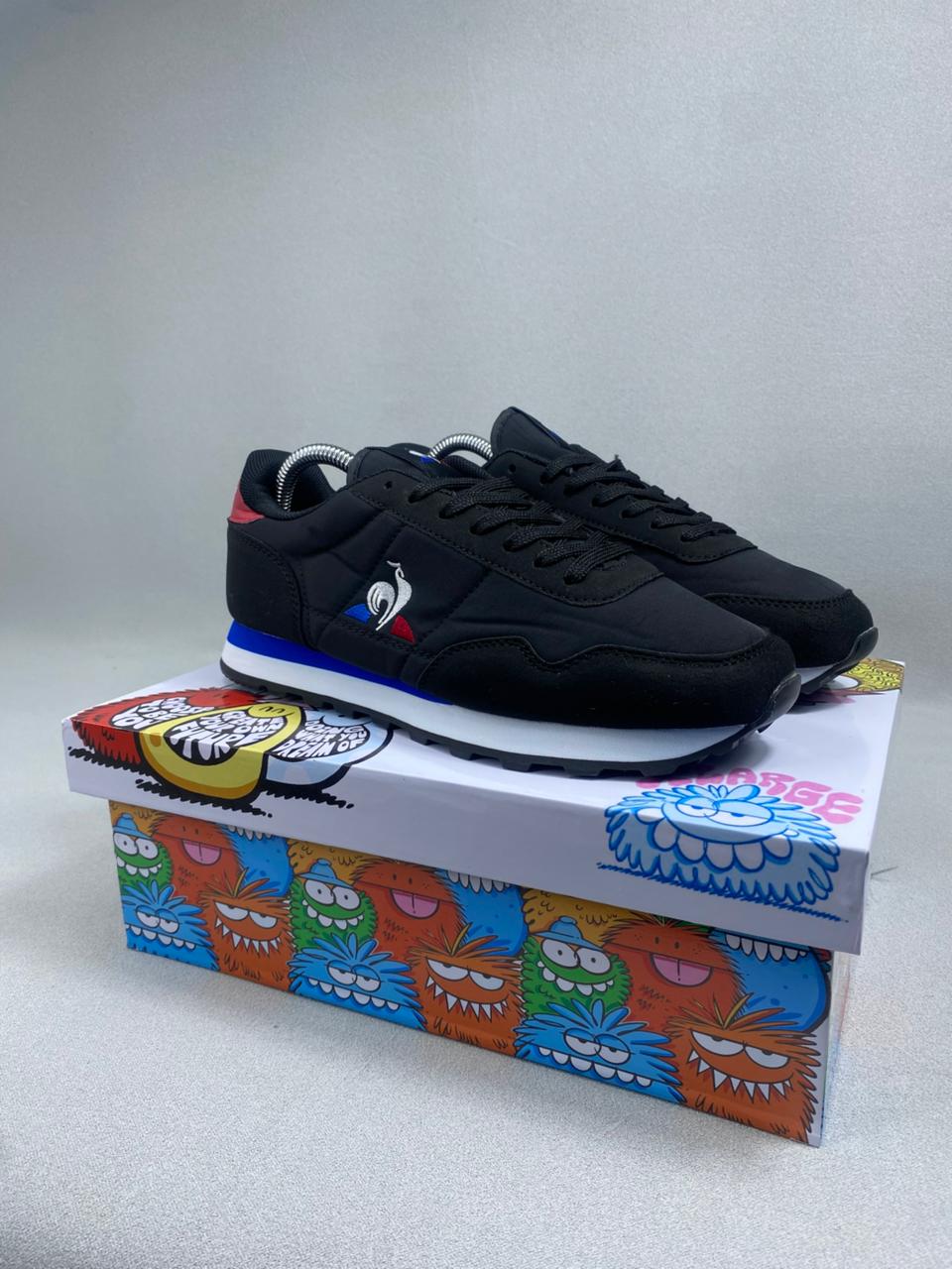 LECOQ SPORTIF HOM NEGRO AZ ROJ